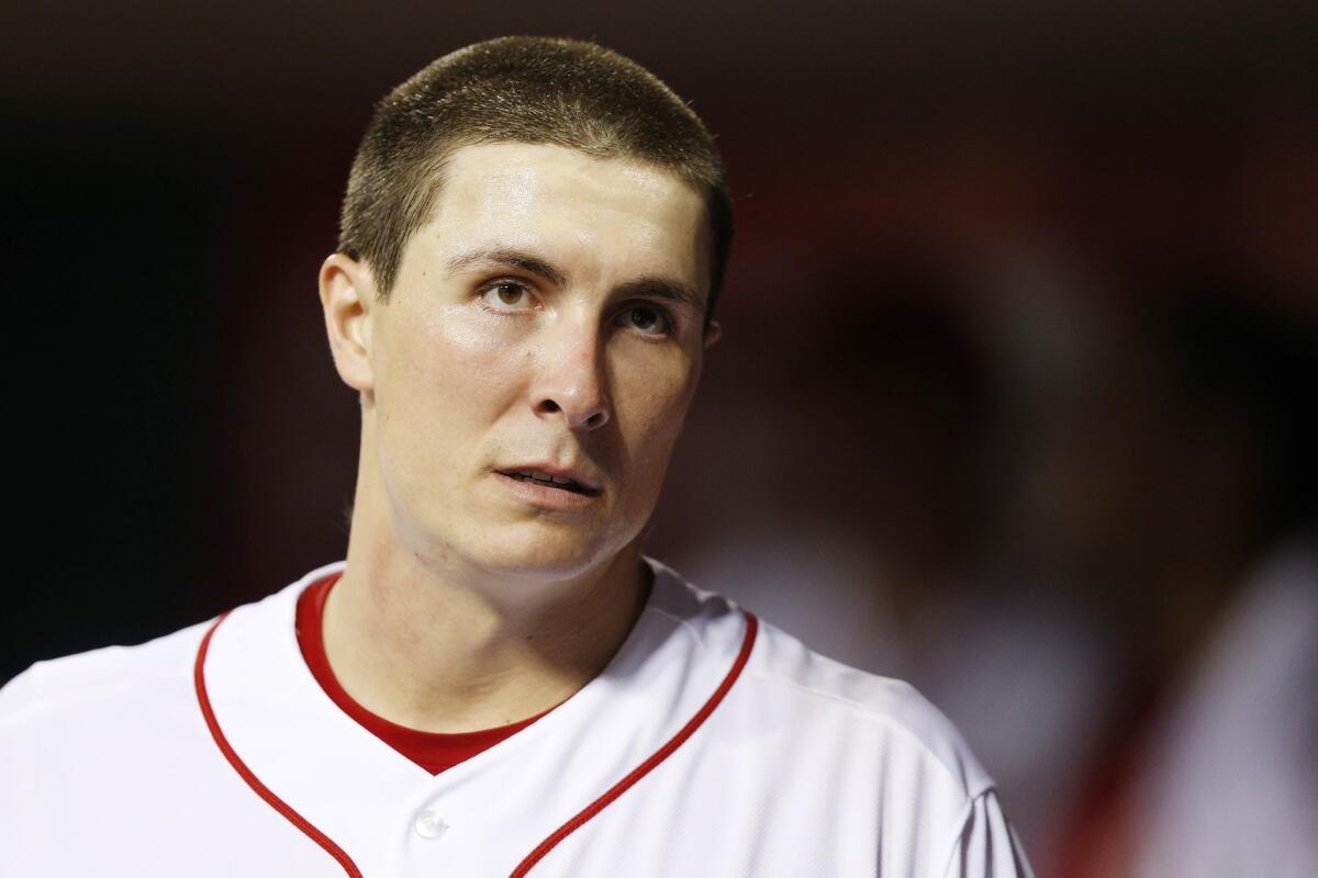 The Cincinnati Reds put pitcher Homer Bailey on the 15-day disabled list because of a strained right elbow.
