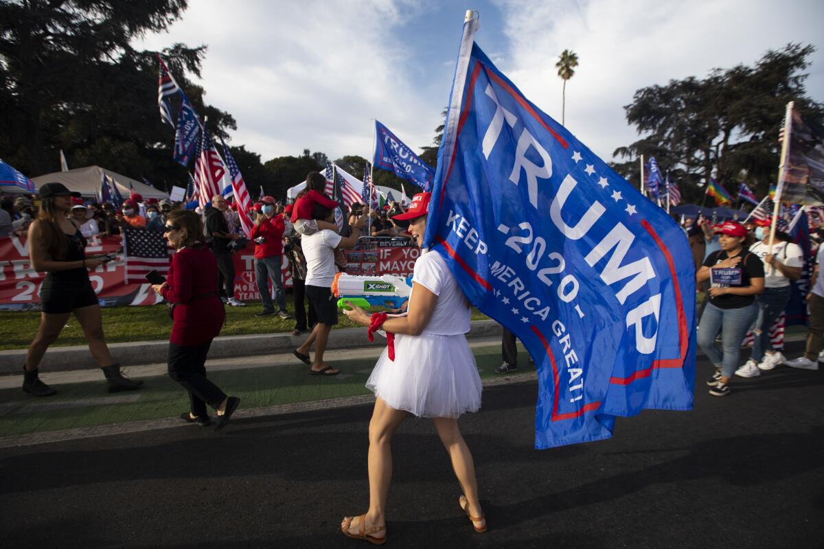 Trump supporters participate in a pre-election rally in Beverly Hills on Oct. 31.