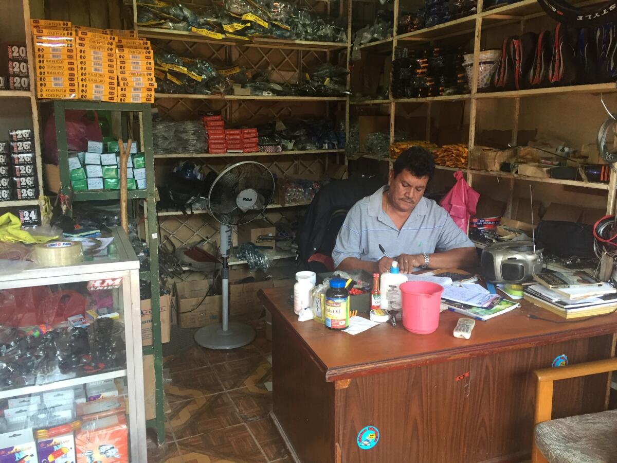 Jorge Rojas Lopez, 58, runs a bicycle shop within the Mercado Oriental. He said he believes he'll work in the market until he dies.