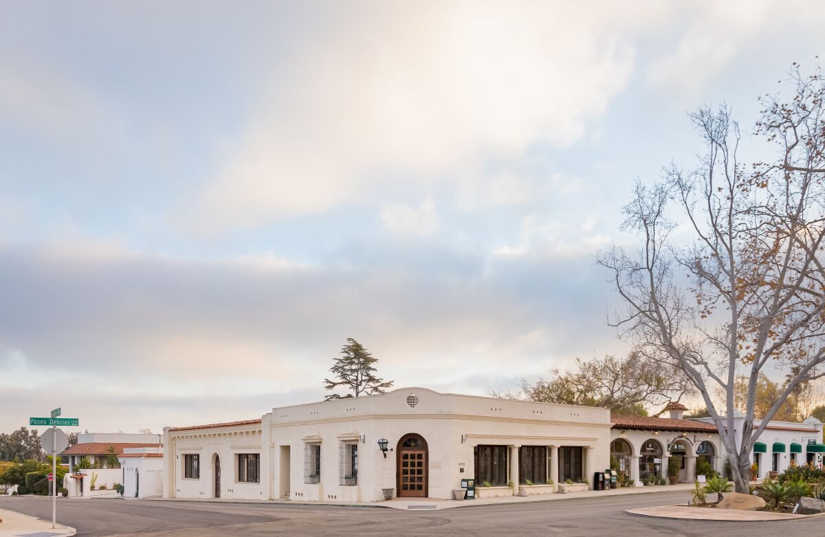 The building at the corner of Paseo Delicias and Via De Santa Fe.