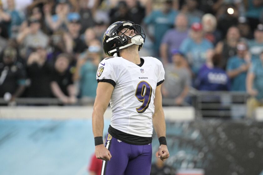 Baltimore Ravens place kicker Justin Tucker (9) reacts after missing a field goal resulting in the Jacksonville Jaguars to win during the second half of an NFL football game, Sunday, Nov. 27, 2022, in Jacksonville, Fla. (AP Photo/Phelan M. Ebenhack)