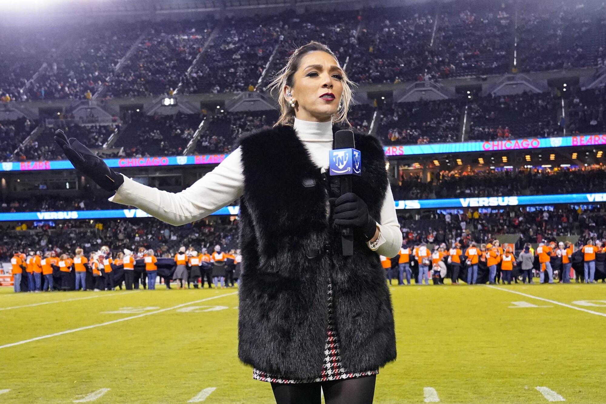 Mayra Gomez the TNF en Español's sideline reporter on field be