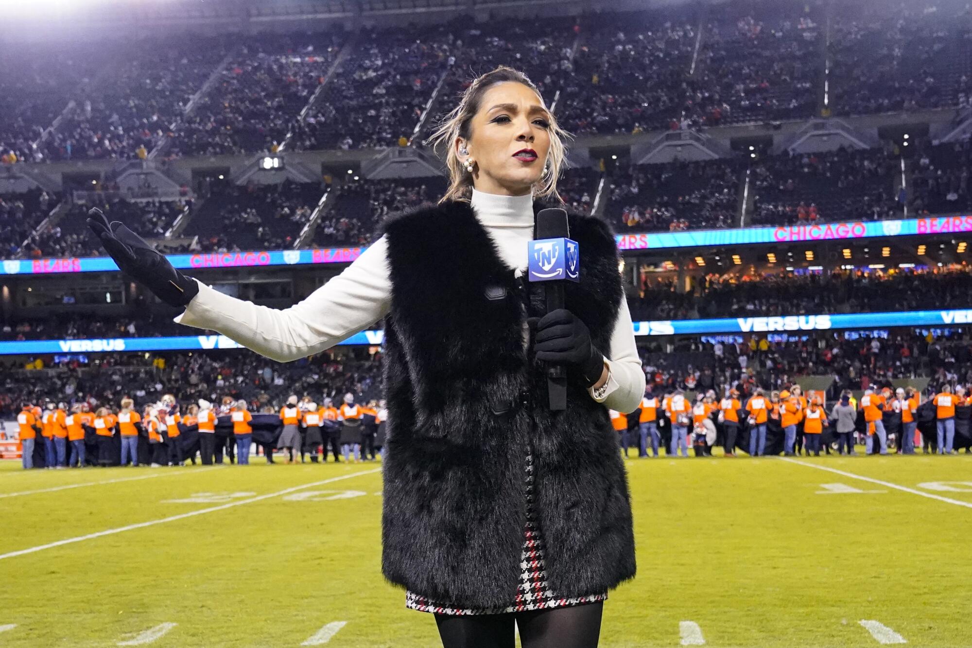 Mayra Gomez the TNF en Español's sideline reporter on field be 