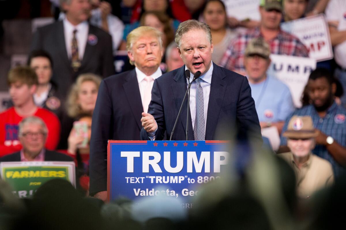 NASCAR Chairman and CEO Brian France, right, speaks at a rally for Donald Trump in Valdosta, Ga., on Monday.