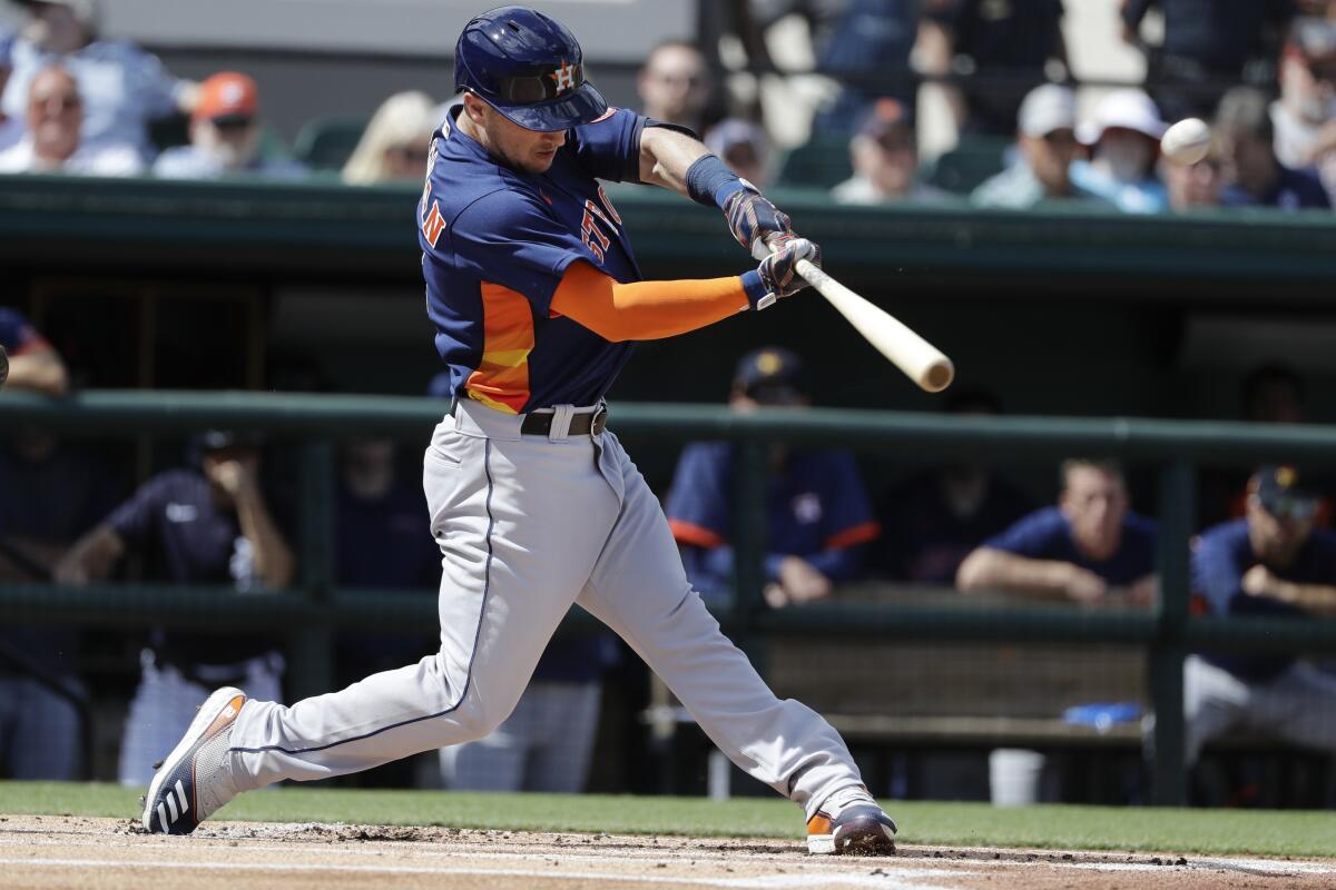 Houston Astros' Alex Bregman hits a double during the first inning of a spring training baseball game against the Detroit Tigers, Monday, Feb. 24, 2020, in Tampa. (AP Photo/Frank Franklin II)