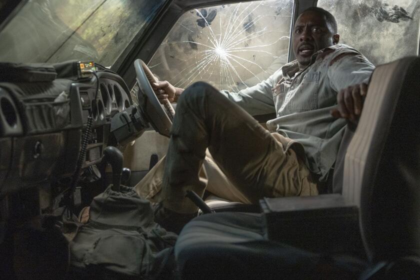 This image released by Universal Pictures shows Idris Elba en una escena de "Beast".