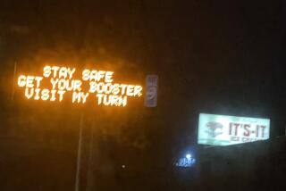 A Caltrans sign on U.S. 101 in the San Francisco Bay Area urged motorists to "get your booster."