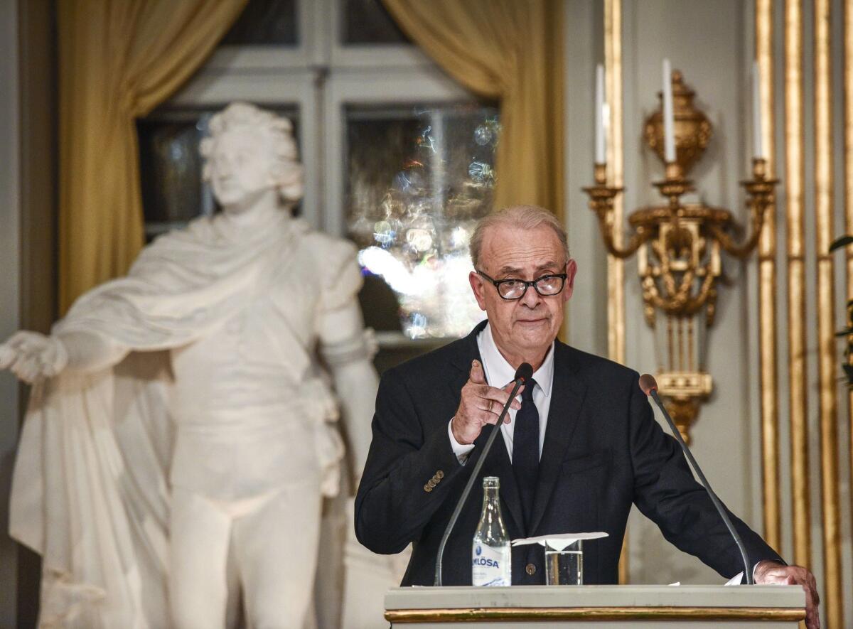 Patrick Modiano, winner of the 2014 Nobel Prize in Literature, speaks at the Swedish Academy in Stockholm.