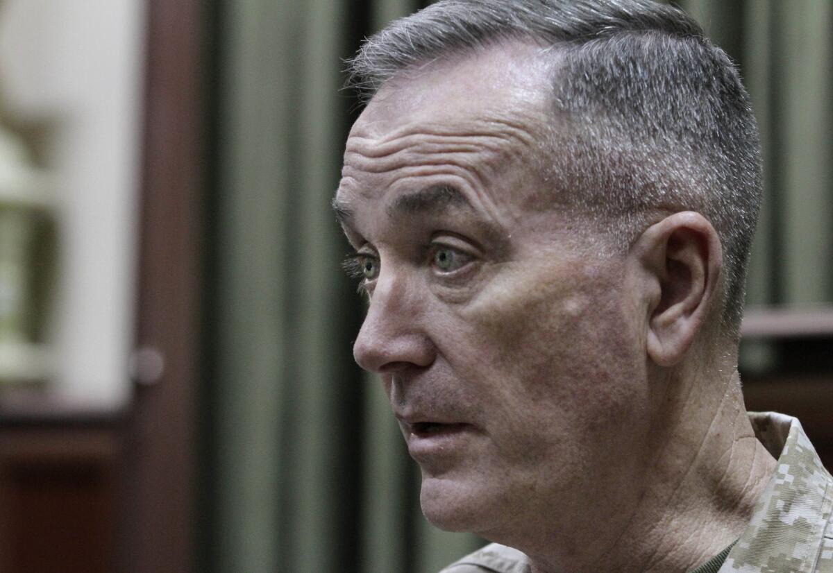 Gen. Joseph Dunford, the U.S. military commander in Afghanistan, speaks during an interview Monday at his headquarters in Kabul. On Wednesday, he announced an agreement with Afghan President Hamid Karzai to eventually hand over security control of Wardak province to Afghan forces.