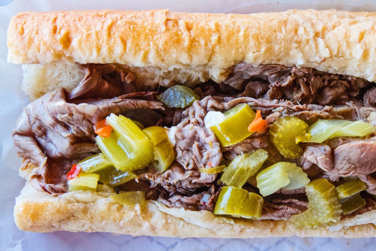 A close-up photo of the Portillo's Italian beef, with celery-heavy giardiniera.