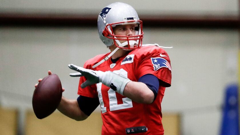 New England Patriots quarterback Tom Brady throws during a practice in Minneapolis on Jan. 31.