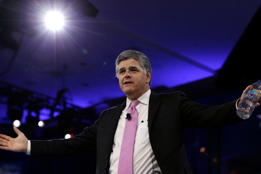 FILE - In this March 4, 2016, file photo, Sean Hannity of Fox News arrives in National Harbor, Md. More than a month after a liberal advocacy group publicly called on advertisers to boycott Sean Hannity's show on Fox News Channel, the luxury car maker Cadillac has been the only new company to publicly back away from the program. (AP Photo/Carolyn Kaster, File)