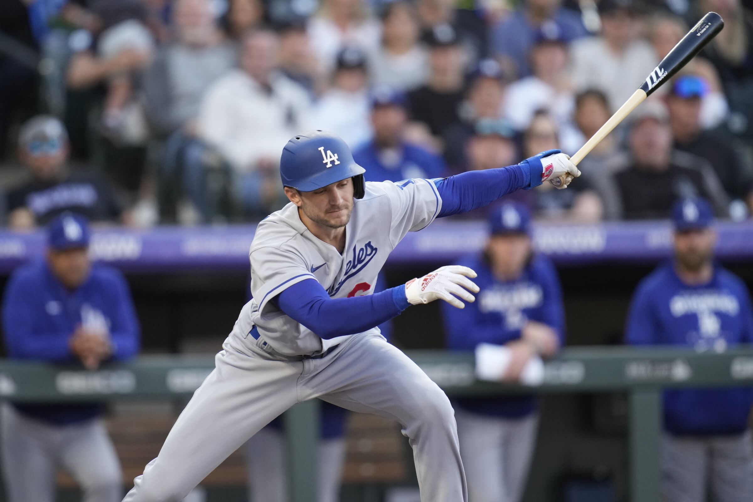 Dodgers' Trea Turner swings at a pitch from Rockies' German Marquez on Saturday .
