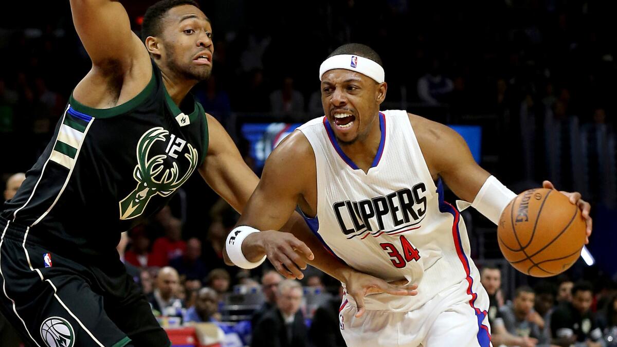 Clippers forward Paul Pierce drives to the basket against Bucks forward Jabari Parker during a game Dec. 16 at Staples Center.
