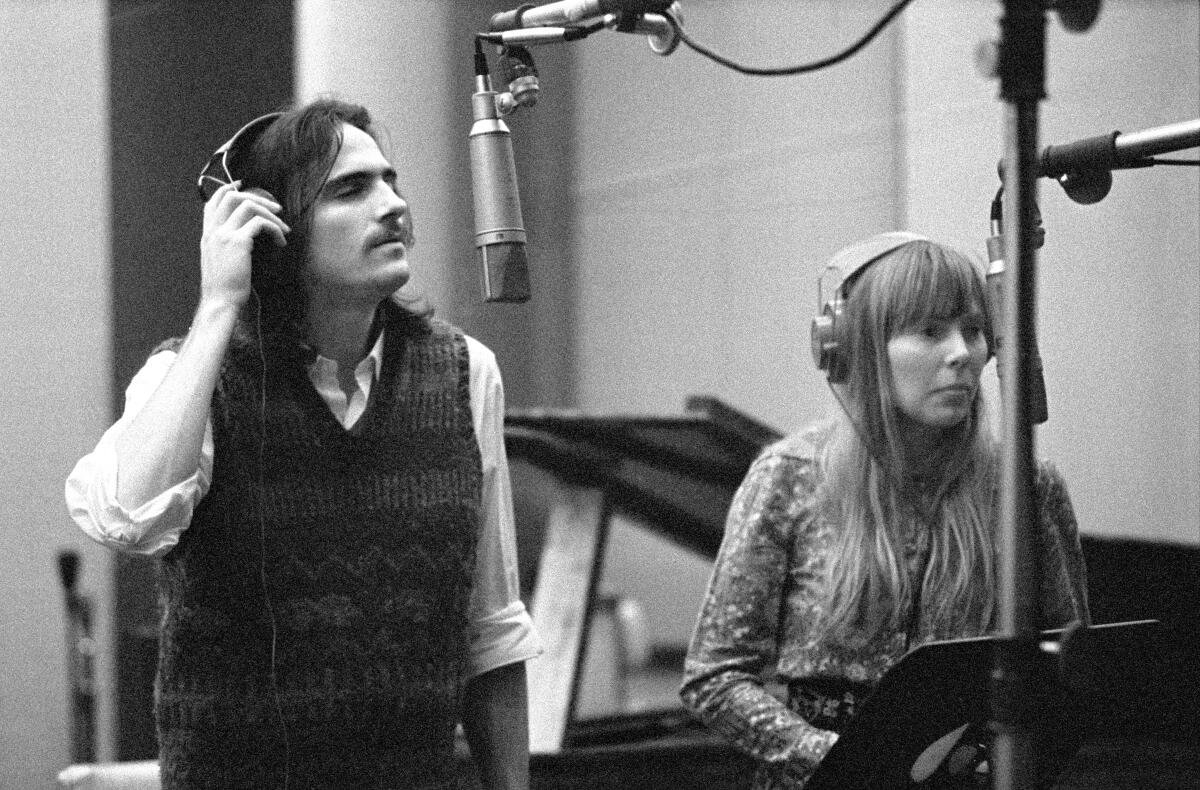 James Taylor and Joni Mitchell recording background vocals for Carole King's "Tapestry." 