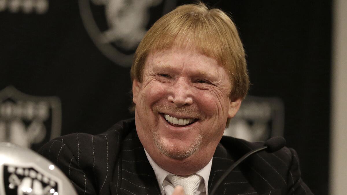 Oakland Raiders owner Mark Davis laughs during a news conference on Jan. 16.
