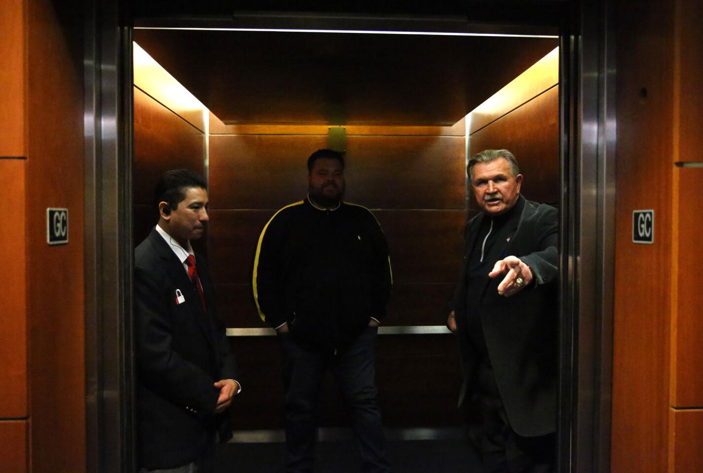 Mike Ditka hops in an elevator as members of the 1985 Chicago Bears arrive at Soldier Field for a reunion to celebrate the 30th anniversary of their Super Bowl victory. The event took place on Tuesday, Jan. 26, 2016.