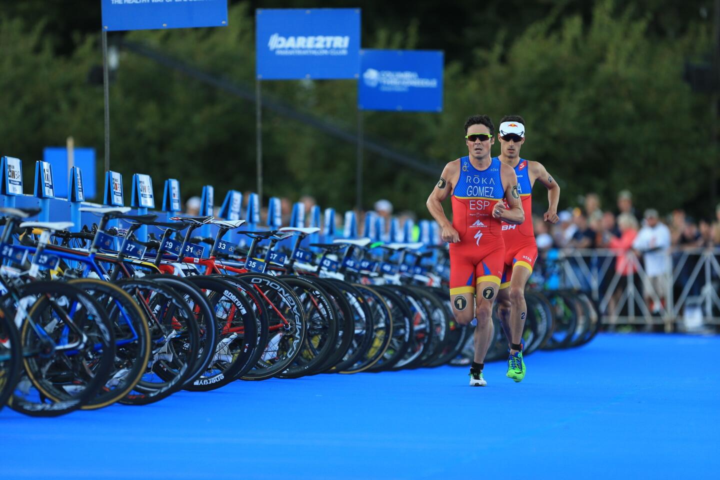 Javier Gomez Nova, left, works to maintain first place during the ITU World Triathlon Grand Final.
