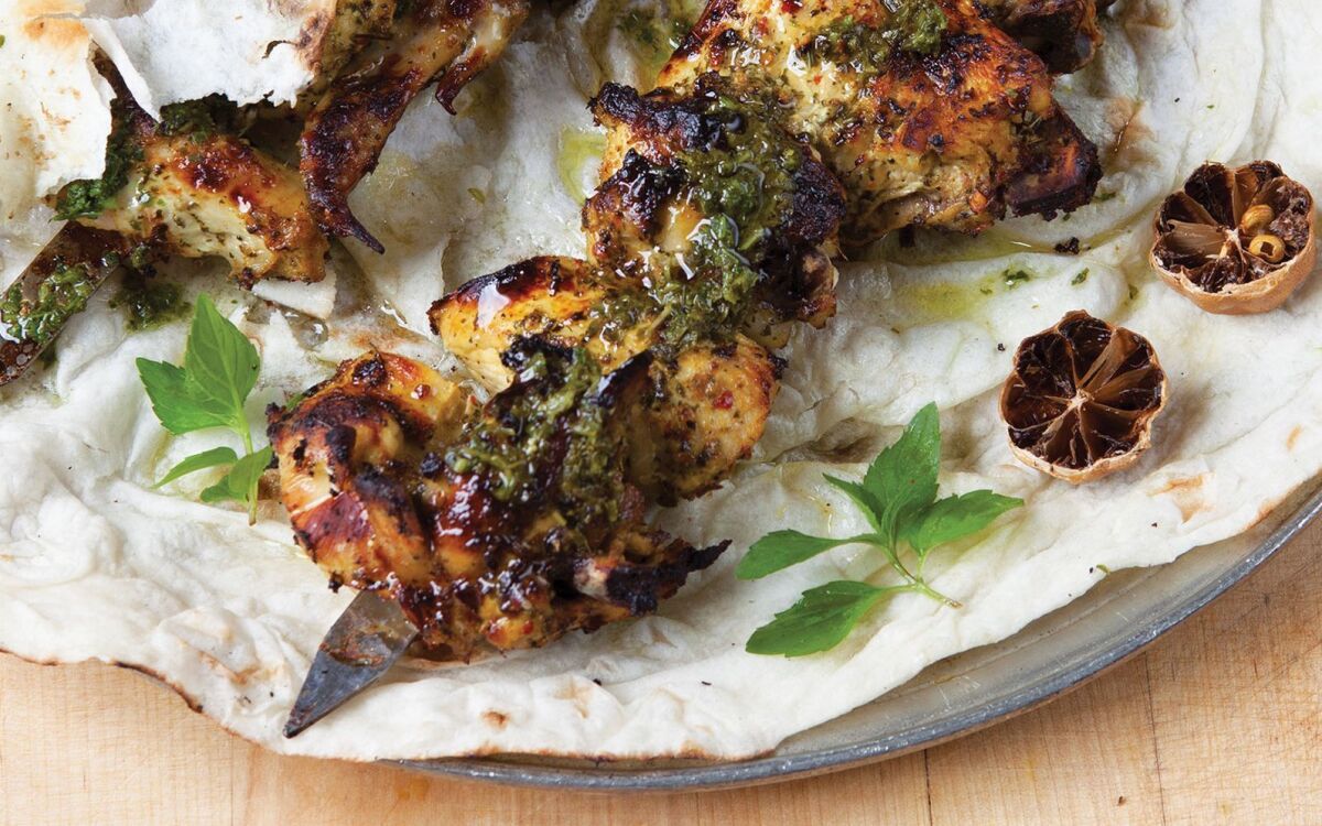 Chicken kabab with dried lime and mint.