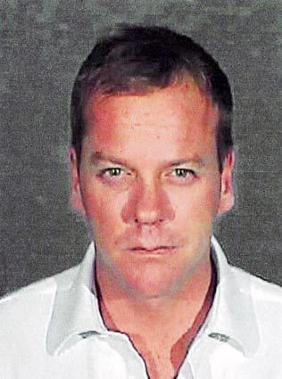 Kiefer Sutherland, shown in this police booking photo, was released from the Glendale jail after completing a 48-day drunken driving sentence.