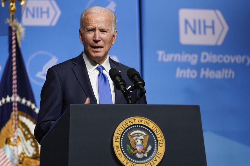 President Joe Biden speaks about the COVID-19 variant named omicron during a visit to the National Institutes of Health, Thursday, Dec. 2, 2021, in Bethesda, Md. (AP Photo/Evan Vucci)