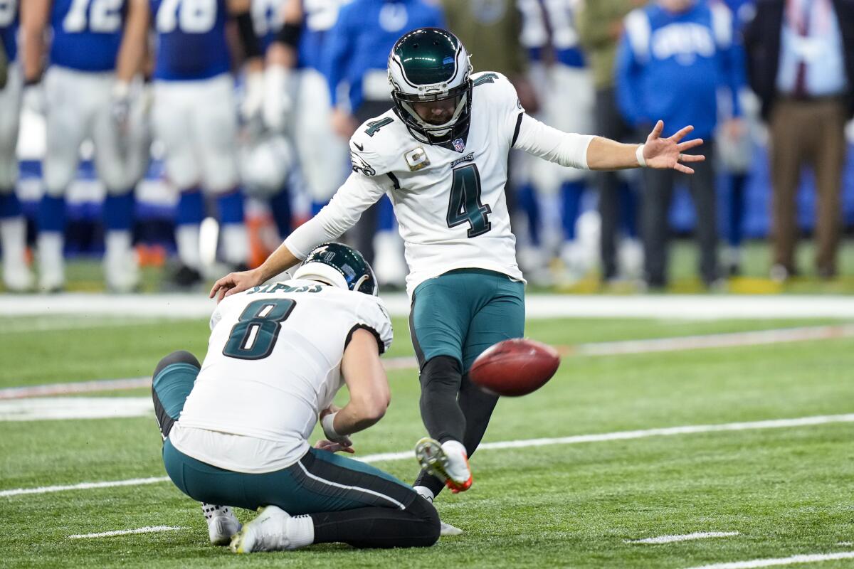 Philadelphia Eagles kicker Jake Elliott (4) kicks a field goal from the hold of Arryn Siposs. 