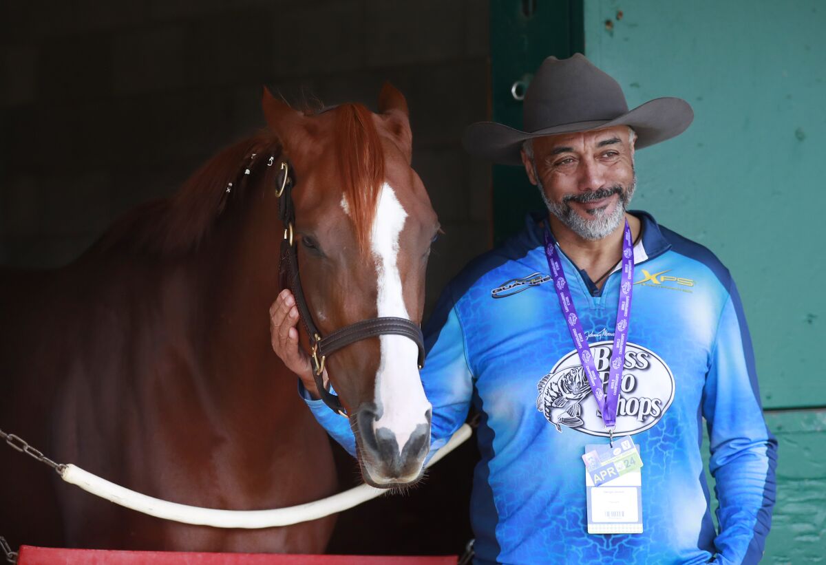 Trainer George Leonard III, shown with the filly California Angel on Tuesday at Del Mar.