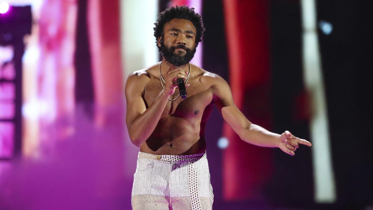 In this Friday, Sept. 21, 2018 file photo, Childish Gambino performs at the 2018 iHeartRadio Music Festival.