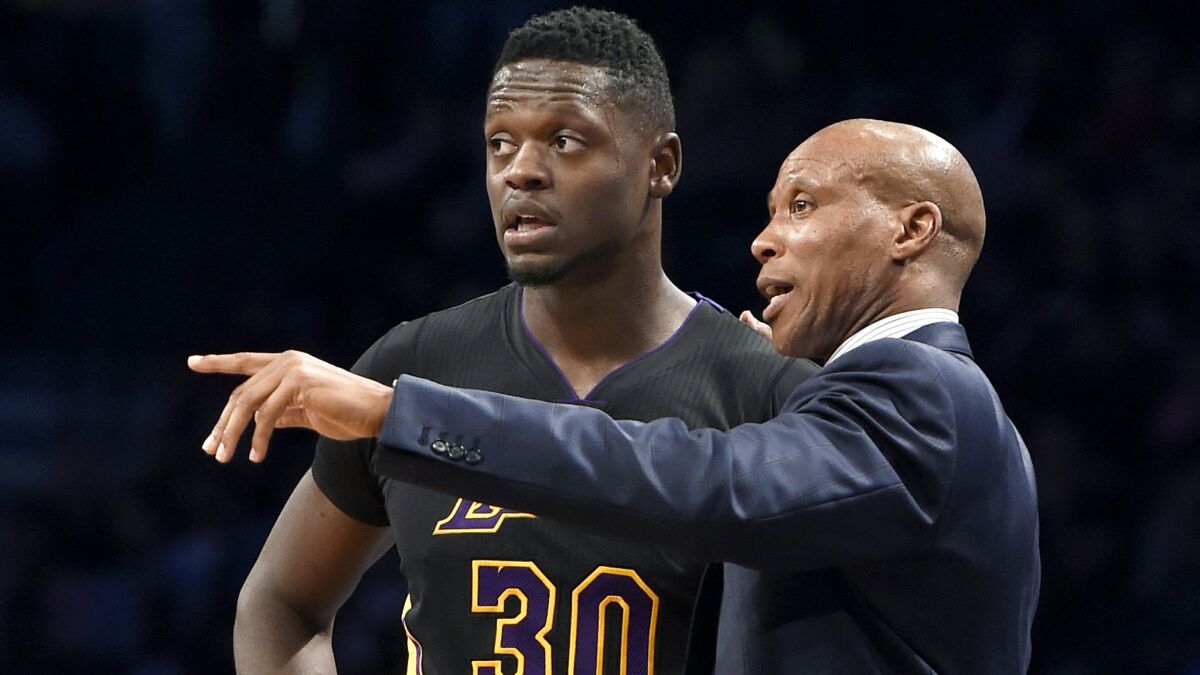 Lakers Coach Byron Scott has some pointers for forward Julius Randle during a game against the Nets on Nov. 6 in Brooklyn.