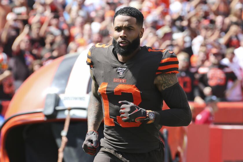 Cleveland Browns wide receiver Odell Beckham Jr. is introduced as he runs out on the field before an NFL football game against the Tennessee Titans, Sunday, Sept. 8, 2019, in Cleveland. The flashy, fashionable wide receiver sported an expensive watch, worth over $250,000, during his debut Sunday. The NFL plans to speak with Browns star Odell Beckham Jr. about wearing a watch in games. (AP Photo/Ron Schwane)