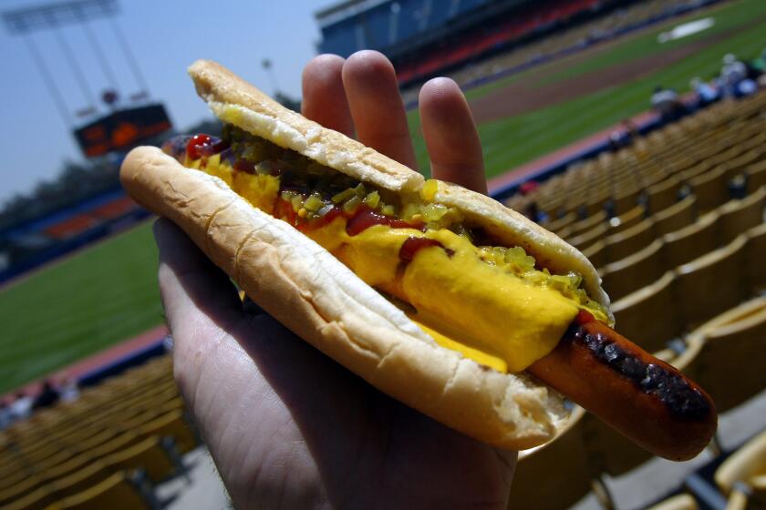 George Wilhelm x23486 –– – 7/5/2003 – A Dodger Dog with ketchup, mustard, and relish.