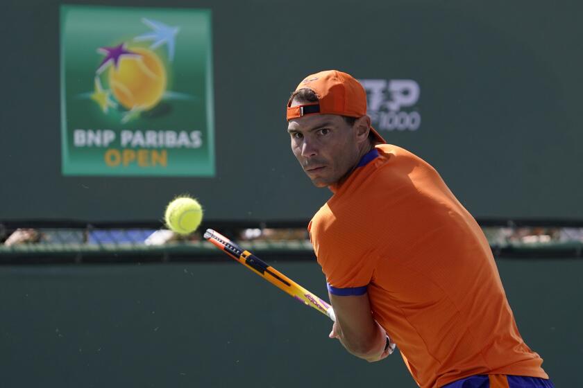 Rafael Nadal, of Spain, returns a shot during practice at the BNP Paribas Open tennis tournament Thursday, March 10, 2022, in Indian Wells, Calif. (AP Photo/Mark J. Terrill)