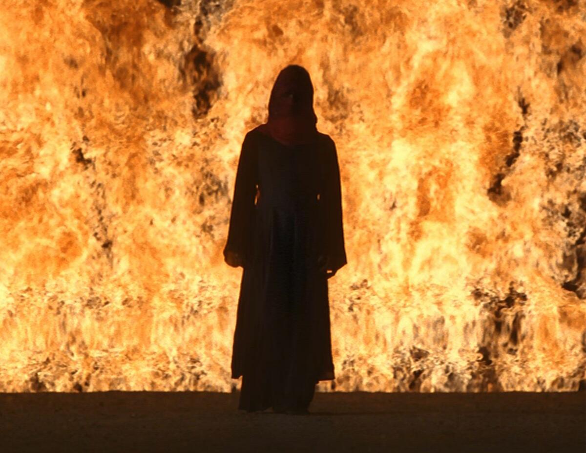 Video still of "Fire Woman" from "The Tristan Project."  Video by Bill Viola.
