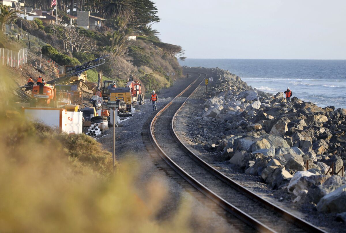 Efforts are underway to stop a landslide that threatens the railroad tracks near the Cyprus Shores community in San Clemente.