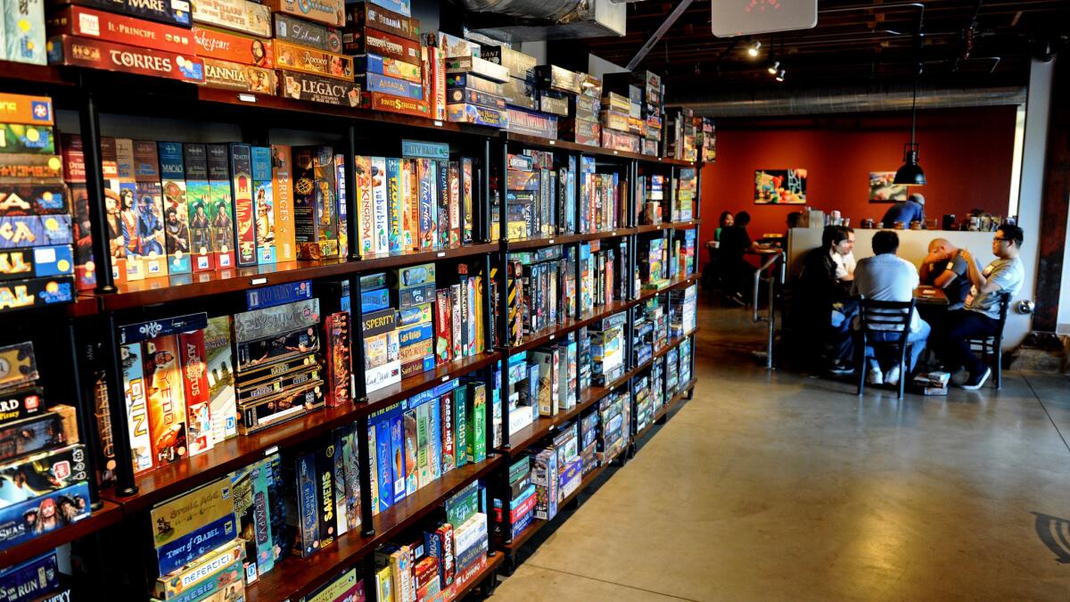 Gaming cafes like GameHaus are social hubs for fans of tabletop games.