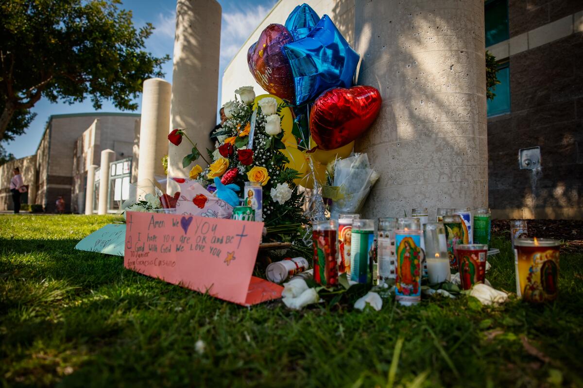 A street memorial outside Ellen Ochoa Learning Center in Cudahy where a teenager was fatally shot. 