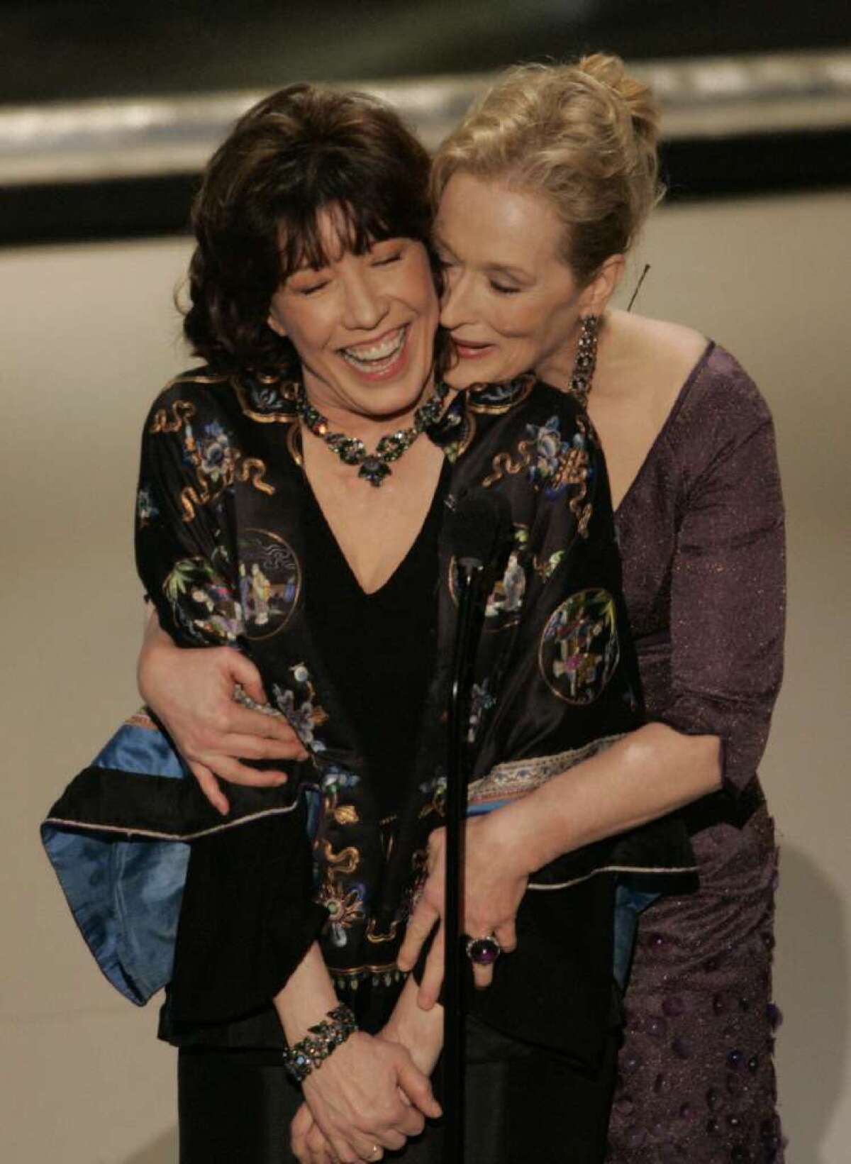 Streep, right, presenting with Lily Tomlin at the Academy Awards in 2006.