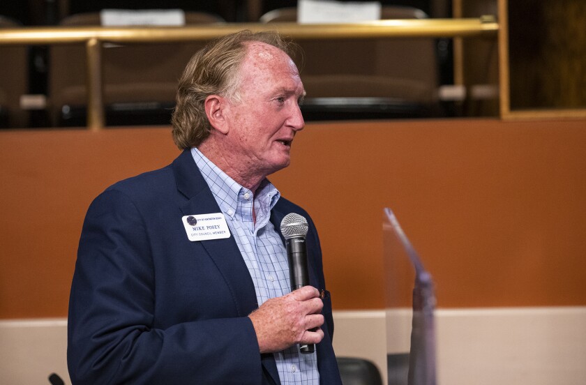Huntington Beach City Councilman Mike Posey asks a question during the OCPA community feedback meeting on Aug. 26.