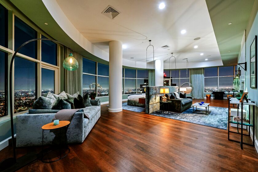 Called "Mansion in the Sky," Matthew Perry's Century City penthouse has about 9,300 square feet of living space, a custom screening room and a center-island kitchen. Perry purchased the residence in the Century building two years ago and worked with architect Scott Joyce and designer LM Pagano to transform the living spaces. New details include subdued colors, textured accents and modern fixtures. The screening room is awash in a plush material.