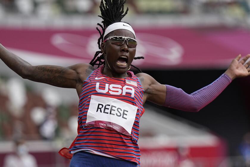 Brittney Reese, of the United States, competes in the women's long jump.