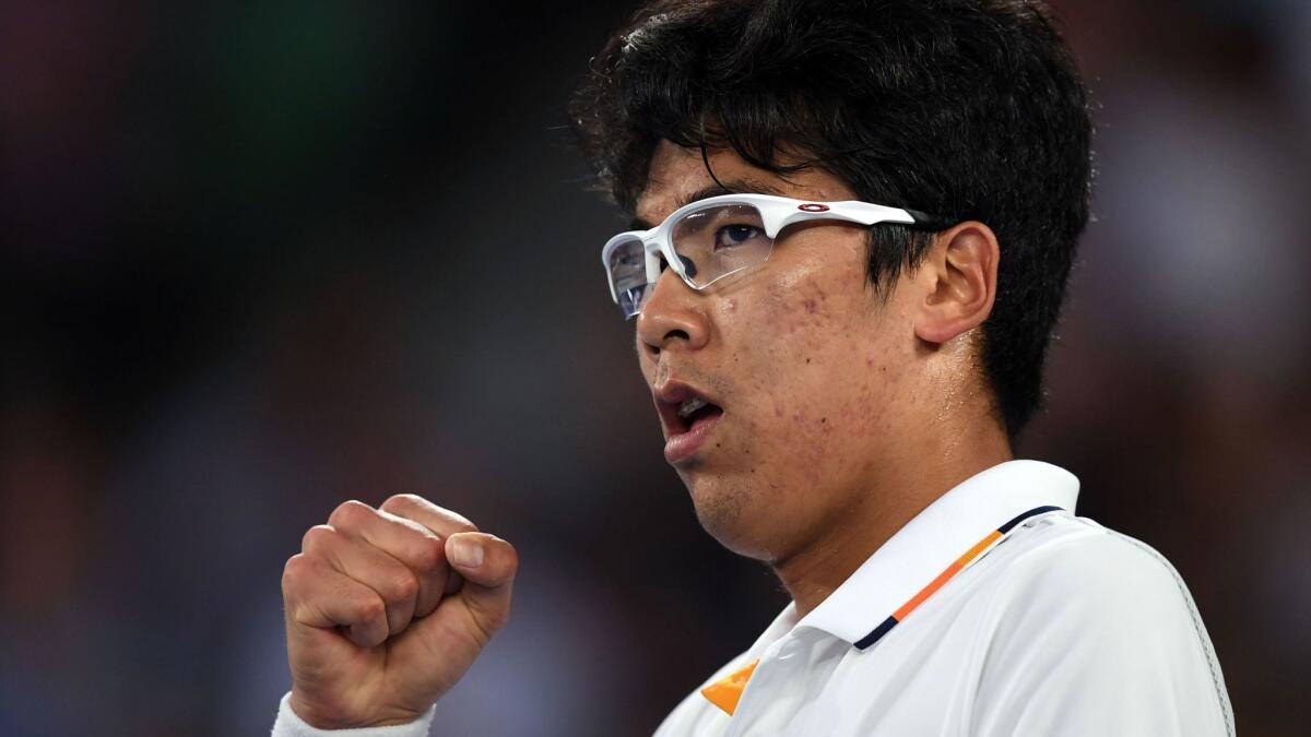 Hyeon Chung of of South Korea pumps his fist in a Jan. 22 match against Novak Djokovic during the Australian Open.