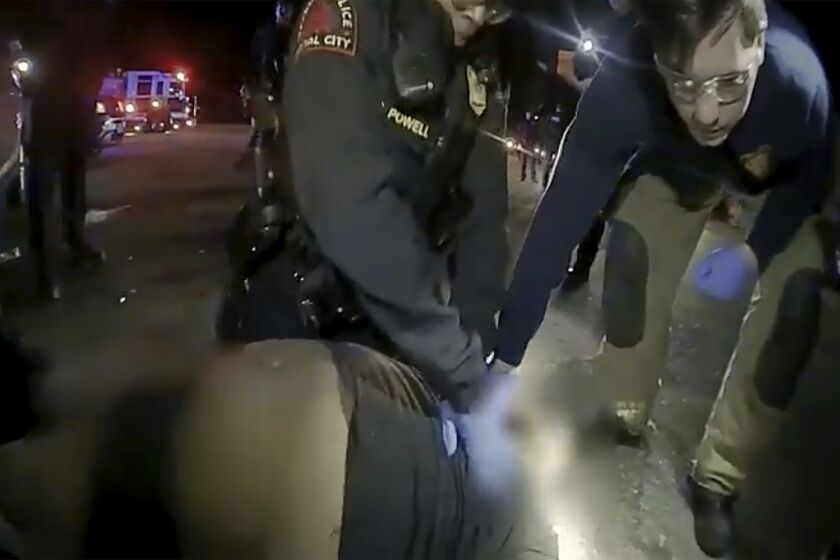 FILE - This screengrab shows the arrest in Raleigh, N.C., of Darryl Tyree Williams, who died after being stunned repeatedly with stun guns on Jan. 17, 2023. Williams died from "sudden cardiac arrest" related to cocaine intoxication and the police confrontation, according to the state's autopsy released on Wednesday, June 7. The Office of the Chief Medical Examiner also labeled Williams' death a homicide. (City of Raleigh via AP, File)