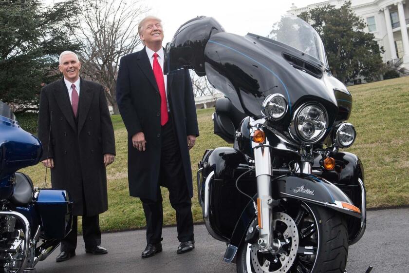 (FILES) In this file photo taken on February 2, 2017 US President Donald Trump jokes with reporters after greeting Harley Davidson executives and union representatives on the South Lawn of the White House in Washington, DC, prior to a luncheon with them. President Donald Trump on June 26, 2018 renewed his attacks on Harley-Davidson, accusing the motorcycle manufacturer of using the trade war as an "excuse" to move production for the European market out of the United States."Early this year Harley-Davidson said they would move much of their plant operations in Kansas City to Thailand. That was long before Tariffs were announced. Hence, they were just using Tariffs/Trade War as an excuse," he said in a tweetstorm about the company. "When I had Harley-Davidson officials over to the White House, I chided them about tariffs in other countries, like India, being too high ... Harley must know that they won't be able to sell back into U.S. without paying a big tax!" / AFP PHOTO / NICHOLAS KAMMNICHOLAS KAMM/AFP/Getty Images ** OUTS - ELSENT, FPG, CM - OUTS * NM, PH, VA if sourced by CT, LA or MoD **