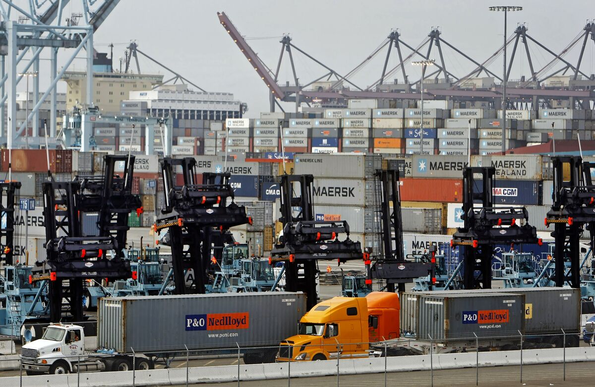Trucks line up at the Port of Los Angeles. Southern California ports account for some 40% of the nation's imports, although the Trump administration's trade war with China has slowed growth.