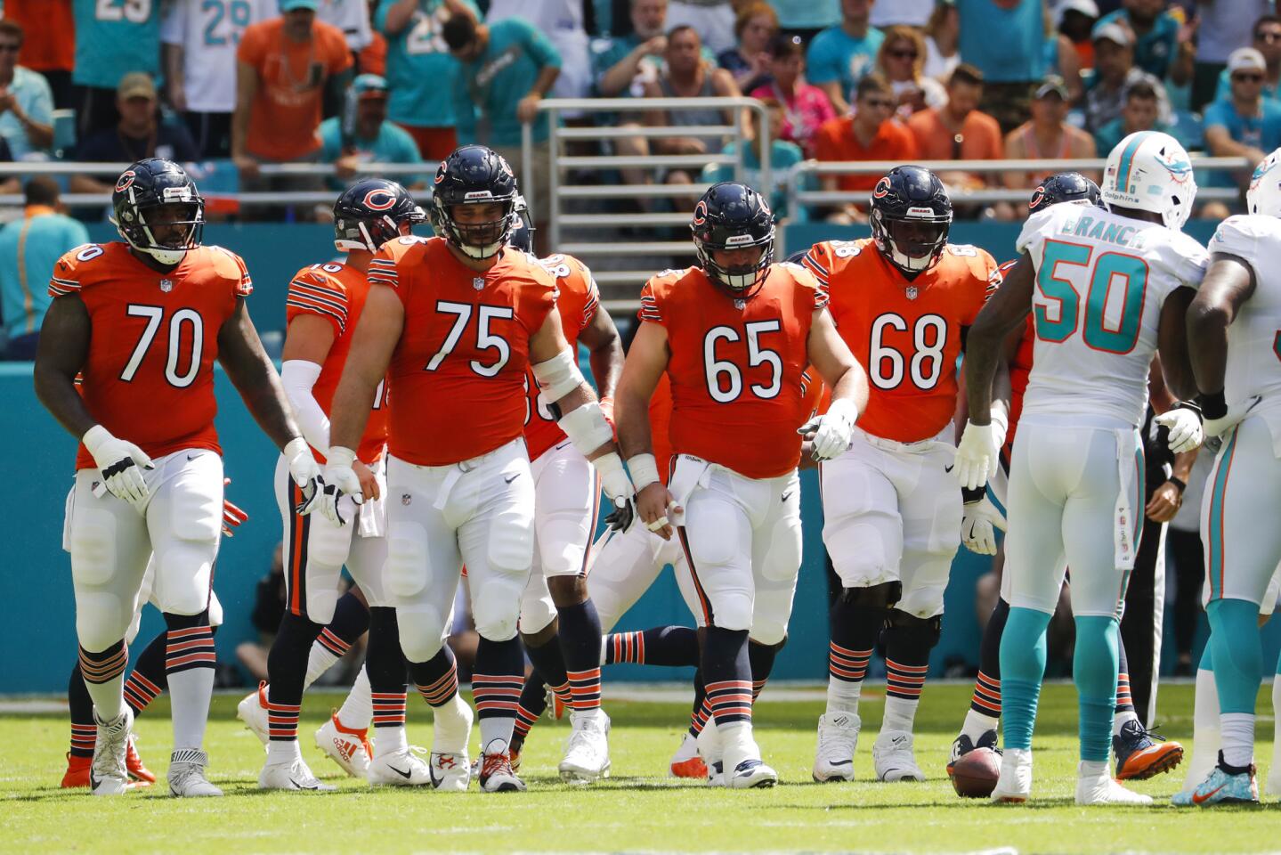 Bears offensive linemen Bobby Massie, from left, Kyle Long, Cody Whitehair and James Daniels in the first quarter against the Dolphins at Hard Rock Stadium in Miami Gardens, Fla., on Oct. 14, 2018.