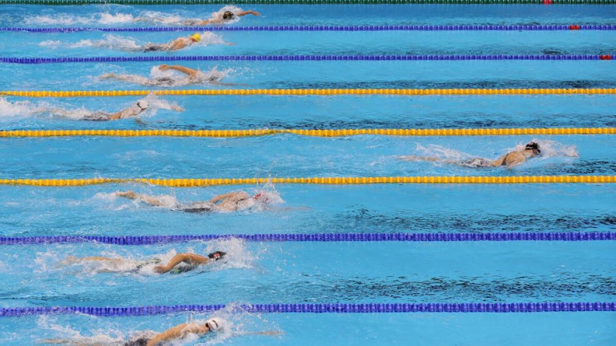 Katie Ledecky pulls away from the field midway through the women's 800-meter freestyle final on Aug. 12.