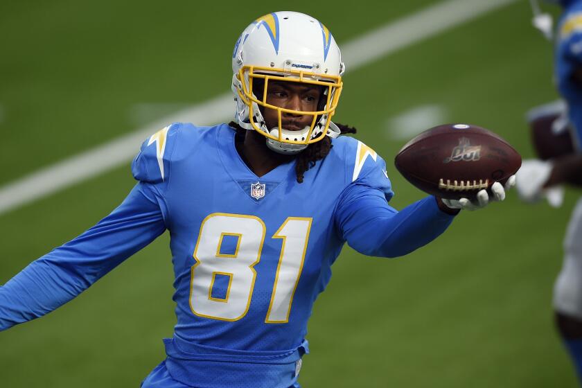 Los Angeles Chargers wide receiver Mike Williams (81) warms up before an NFL football game.