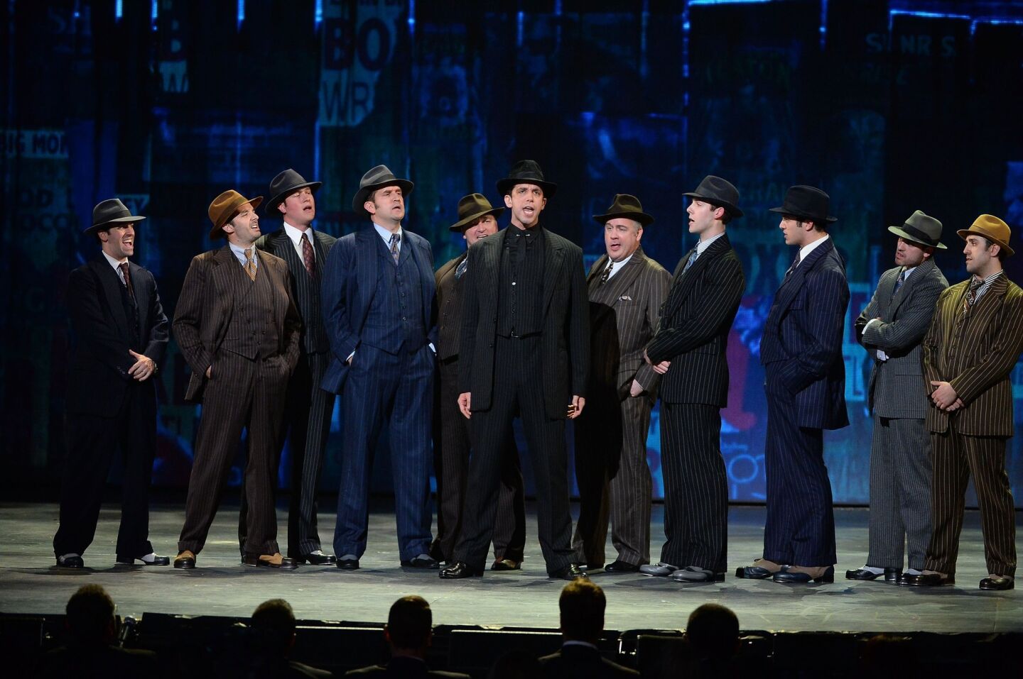 The cast of "Bullets Over Broadway" performs onstage.