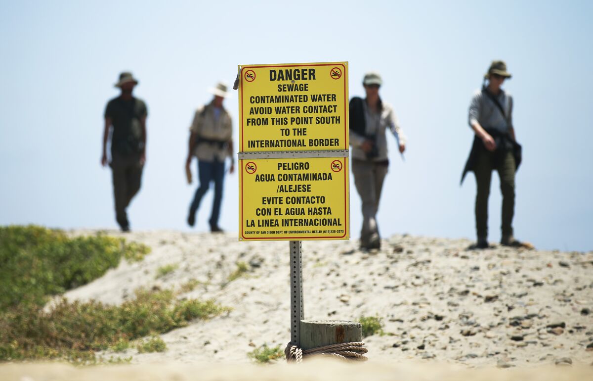 Signs warn of contaminated ocean water in Imperial Beach 
