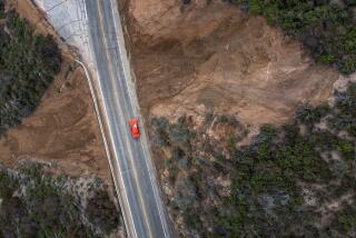 LA CANADA-FLINTRIDGE, CA - MARCH 30 : In an aerial view, landslides along the Angeles Crest Highway (SR 2) continue to grow as the latest in a parade of storms that have created disasters across the state all year breaks up on March 30, 2023 near La Cañada-Flintridge, California. In striking contrast to the previous years of severe to extreme drought, more than a dozen atmospheric river storm events have steadily swept in from the Pacific Ocean bringing extreme weather, including huge surf, unprecedented rainfalls, widespread flooding and record mountain snowpack depths that have covered two story houses and kept many people snowbound without fresh supplies for weeks. The heavy rain and snowmelt have refilled most major reservoirs, which had nearly dried up in recent years, giving at least temporary relief from the worst drought in 1,200 years. (Photo by David McNew/Getty Images)
